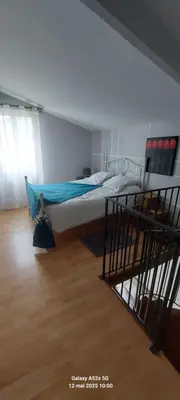 Un ou plusieurs lits dans un hébergement de l'établissement Maison des Gabelous