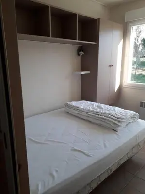 Un ou plusieurs lits dans un hébergement de l'établissement Maison calme proche mer - La Roseraie