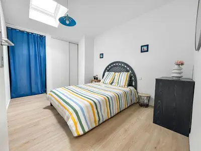 Un ou plusieurs lits dans un hébergement de l'établissement Vue mer panoramique, Loggia Salon, Parking Privé