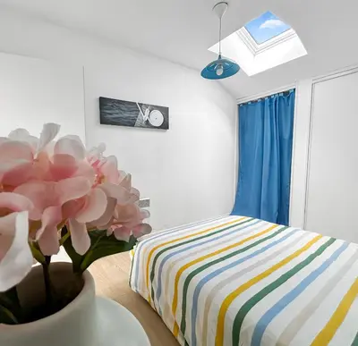 Un ou plusieurs lits dans un hébergement de l'établissement Vue mer panoramique, Loggia Salon, Parking Privé