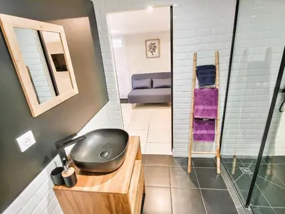 Coin salon dans l'établissement Le Petit Rocher 30m2- Studio standing 3 étoiles