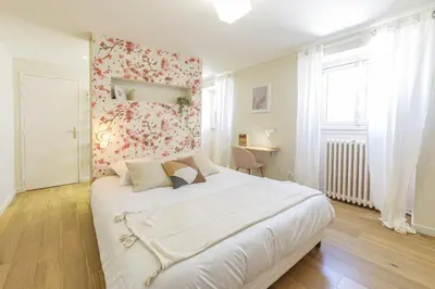 Un ou plusieurs lits dans un hébergement de l'établissement Chambre Crémant - Maison Bossoreil