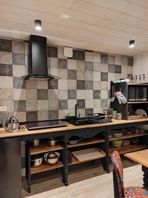 Cuisine ou kitchenette dans l'établissement GITE DE LA JANIERE