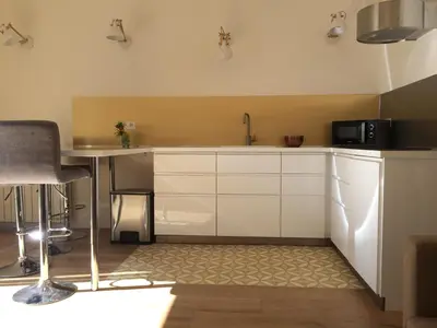Cuisine ou kitchenette dans l'établissement La MAISON du ROUGE GORGE