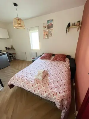 Un ou plusieurs lits dans un hébergement de l'établissement Studio - Cosy Kaza