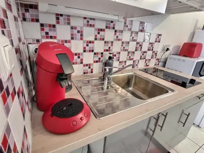 Cuisine ou kitchenette dans l'établissement Superbe Type 2 - Cosy et Chaleureux