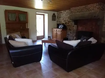 Coin salon dans l'établissement Gite Les Fées - 6 Personnes maxi