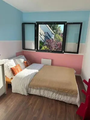 Un ou plusieurs lits dans un hébergement de l'établissement Villa 4ch 4Sdb à 5min de Nantes