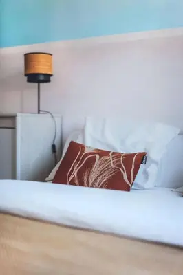 Un ou plusieurs lits dans un hébergement de l'établissement Villa 4ch 4Sdb à 5min de Nantes