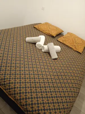 Un ou plusieurs lits dans un hébergement de l'établissement Le Cocon Familial - Dormir Comme A La Maison -