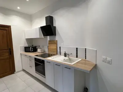 Cuisine ou kitchenette dans l'établissement Le cottage de l’Oudon