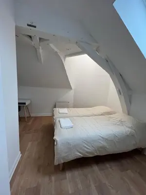 Un ou plusieurs lits dans un hébergement de l'établissement Le cottage de l’Oudon