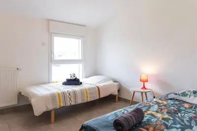 Un ou plusieurs lits dans un hébergement de l'établissement gîte maison d'Anetz