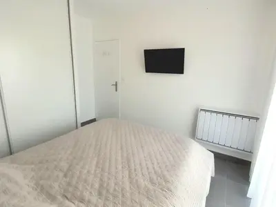 Un ou plusieurs lits dans un hébergement de l'établissement Appartement NEUF 1 chambre, 4 pers, 350m plage Saint Jean de Monts, calme, forêt, commerces à proximité - FR-1-323-268