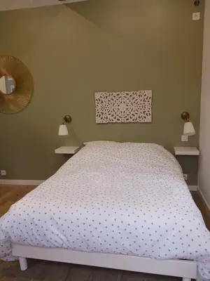Un ou plusieurs lits dans un hébergement de l'établissement Maison indépendante cosy avec terrasse privée - La Laiterie