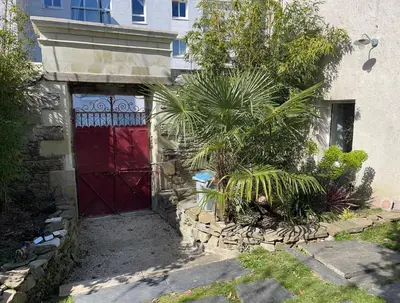 Jardin de l'établissement Maison indépendante cosy avec terrasse privée - La Laiterie