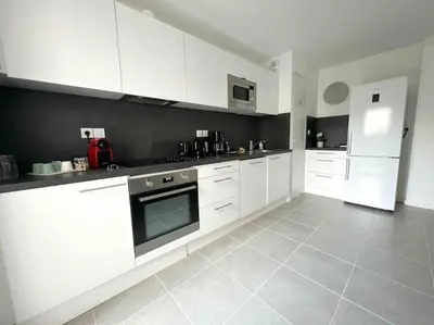 Cuisine ou kitchenette dans l'établissement La Rayon'Nantes
