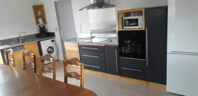 Cuisine ou kitchenette dans l'établissement Gîte de la Poilane - Maison avec piscine & vue sur vignes, proche Angers