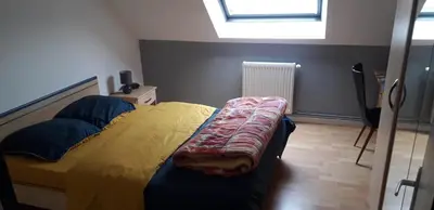 Un ou plusieurs lits dans un hébergement de l'établissement Gîte de la Poilane - Maison avec piscine & vue sur vignes, proche Angers