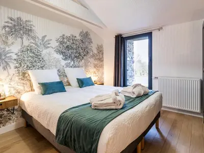 Un ou plusieurs lits dans un hébergement de l'établissement Gîte Au Calme Près de Nantes avec Wifi - FR-1-306-1235