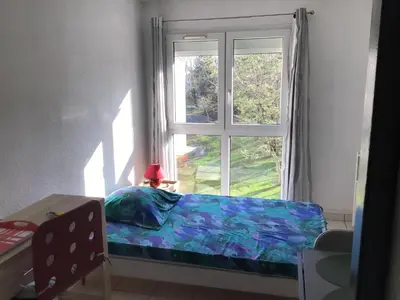 Un ou plusieurs lits dans un hébergement de l'établissement Studio quartier Porcé 5 mn plage