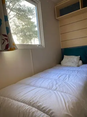 Un ou plusieurs lits dans un hébergement de l'établissement Camping Cœur De Vendée