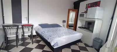 Cuisine ou kitchenette dans l'établissement Chambre privative à st remy en mauges