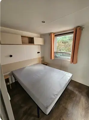 Un ou plusieurs lits dans un hébergement de l'établissement Superbe Mobil home 6-8 personnes (57)