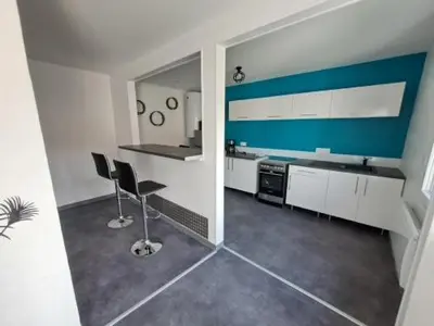 Cuisine ou kitchenette dans l'établissement Les embruns