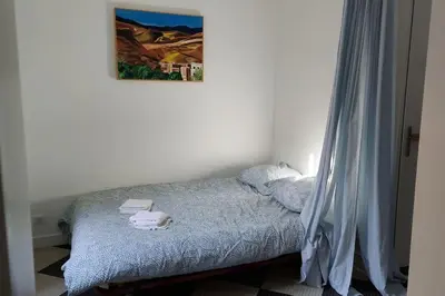 Un ou plusieurs lits dans un hébergement de l'établissement Appartement 2 pièces proche cathédrale