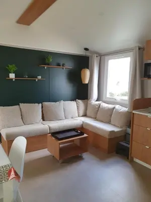 Coin salon dans l'établissement Camping du Bois Dormant