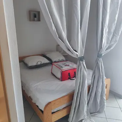 Un ou plusieurs lits dans un hébergement de l'établissement Face estacade, studio 4 personnes vue mer