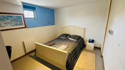 Un ou plusieurs lits dans un hébergement de l'établissement Maison calme pour 6 personnes