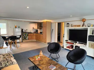 Télévision ou salle de divertissement dans l'établissement Maison calme pour 6 personnes