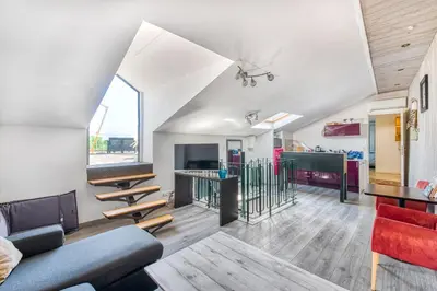 Coin salon dans l'établissement Superbe Appartement Vue sur la Confluence LOIRE