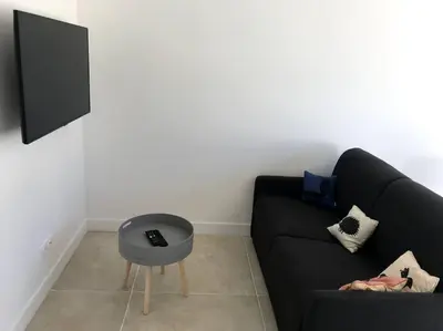 Télévision ou salle de divertissement dans l'établissement Maisonnette 2 pièces 100m de la plage de la Clère