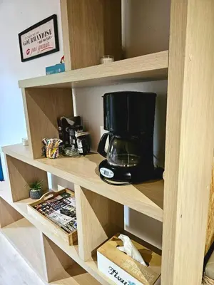 Cuisine ou kitchenette dans l'établissement Studio confort chez Lolita et Wilfried
