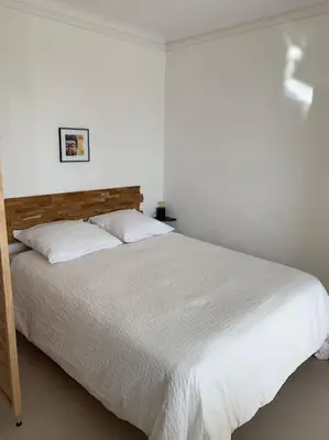 Un ou plusieurs lits dans un hébergement de l'établissement Studio face mer Accès direct à la plage