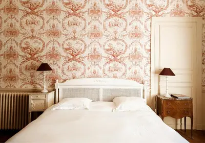 Un ou plusieurs lits dans un hébergement de l'établissement Le 1825, une suite luxueuse au coeur de la ville