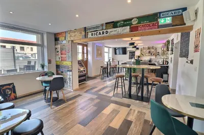 Restaurant ou autre lieu de restauration dans l'établissement Hôtel Le Smile