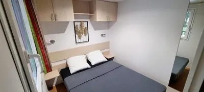 Un ou plusieurs lits dans un hébergement de l'établissement Mobil Home 5 Personnes - Vendée - Puy du Fou - Climatisé