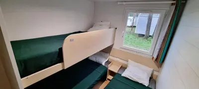 Coin salon dans l'établissement Mobil Home 5 Personnes - Vendée - Puy du Fou - Climatisé