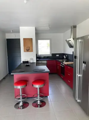 Cuisine ou kitchenette dans l'établissement Chez Nana