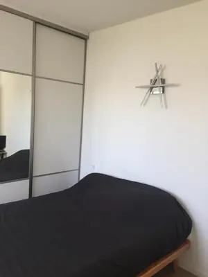 Un ou plusieurs lits dans un hébergement de l'établissement Chambre à louer 1 à 2 personnes chez l'habitant