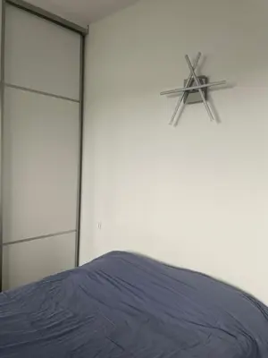 Un ou plusieurs lits dans un hébergement de l'établissement Chambre à louer 1 à 2 personnes chez l'habitant