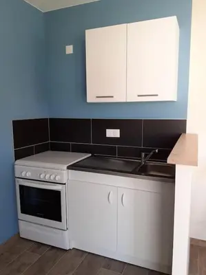 Cuisine ou kitchenette dans l'établissement chez Virginie et Jacky