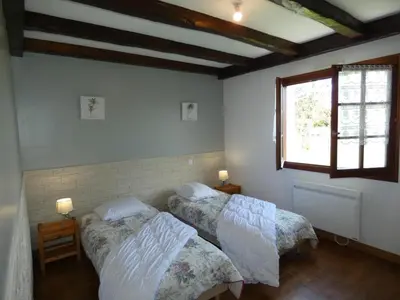 Un ou plusieurs lits dans un hébergement de l'établissement Maison Vacances Notre-Dame-de-Monts, Jardin, Animaux Ok - FR-1-540-236