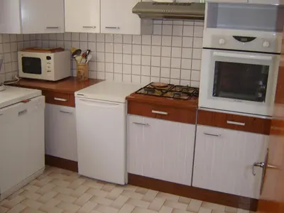 Cuisine ou kitchenette dans l'établissement Maison spacieuse 8 pers avec jardin, animaux admis - FR-1-540-256