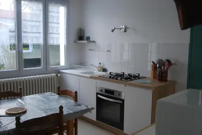 Cuisine ou kitchenette dans l'établissement Vaiana