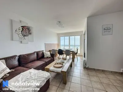 Coin salon dans l'établissement Bord de mer vue panoramique avec parking privé